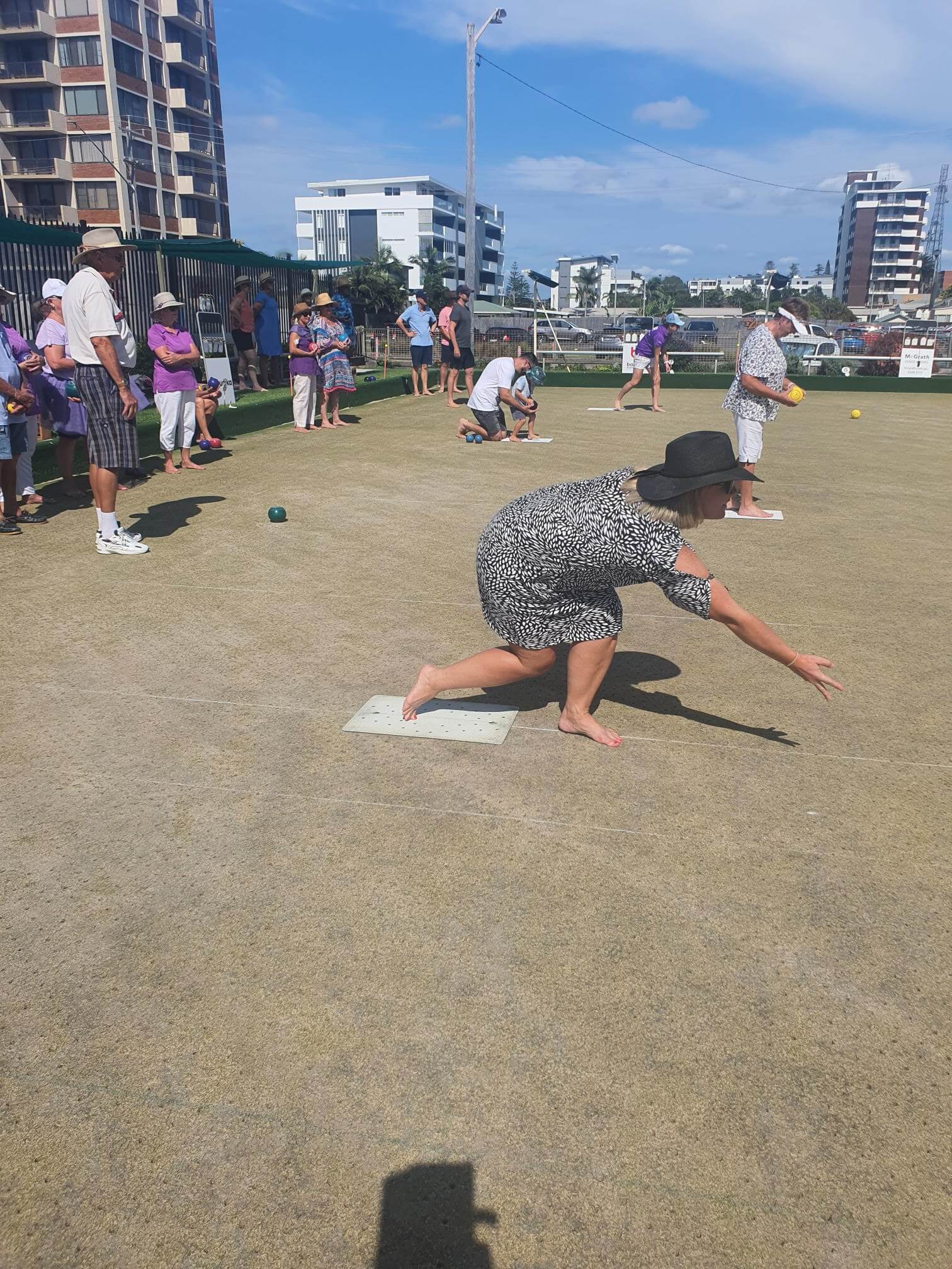 One of the Barefoot Bowlers showing how it is done in style. image