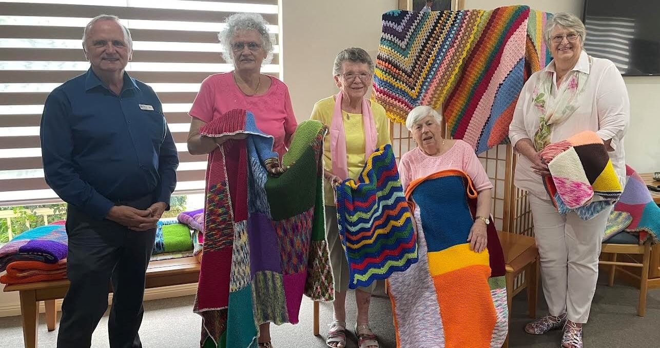 Lincoln Gardens residents donate beautiful hand knitted blankets to the Port Macquarie Base Hospital Palliative Care team image