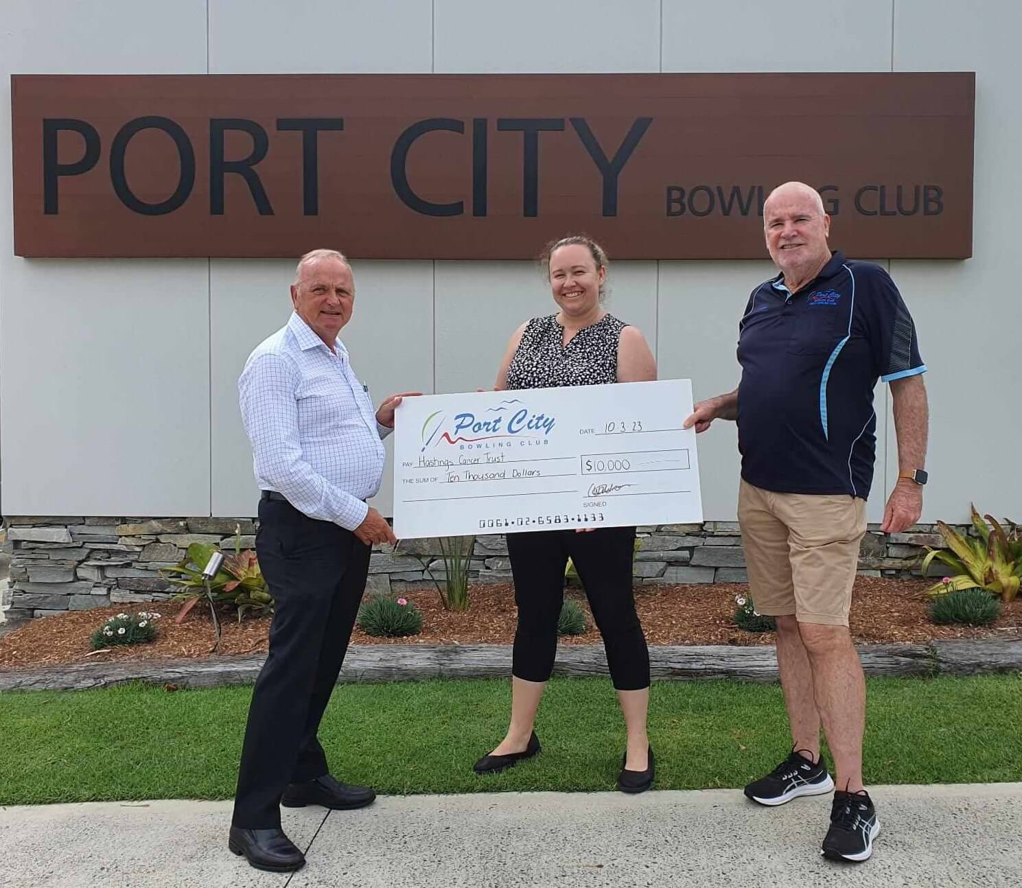Chris King, Chairman of the Port City Bowling Club and Katy-Lee Waldron presenting a cheque for $10,000
